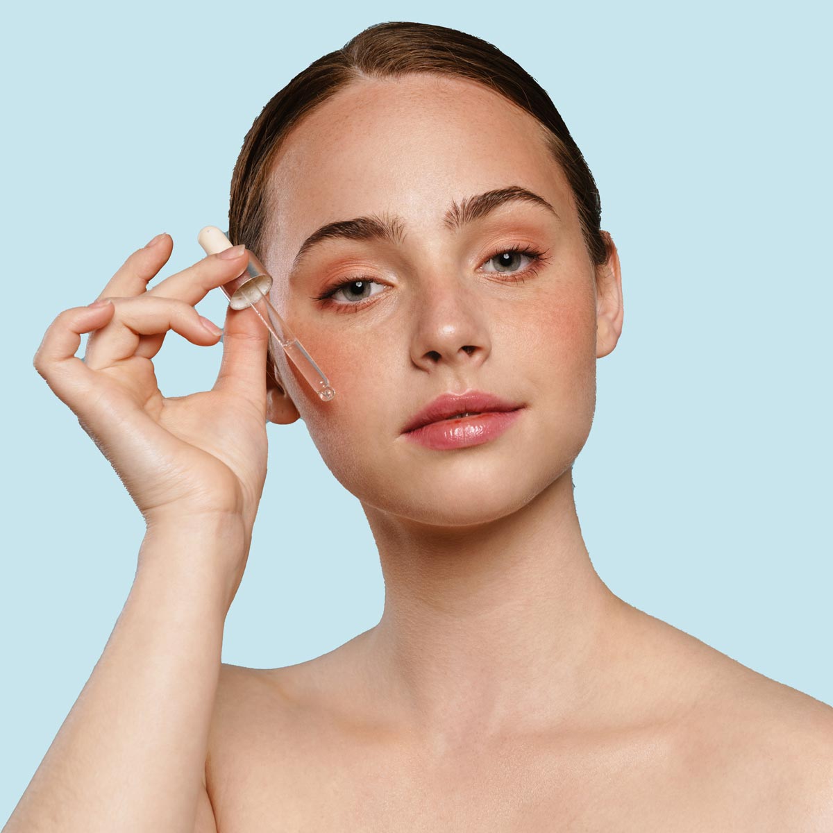 portrait-of-a-young-healthy-white-woman-holding-bo